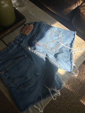Vintage Levi's Light Blue Frayed Denim Cutoff Mid Shorts